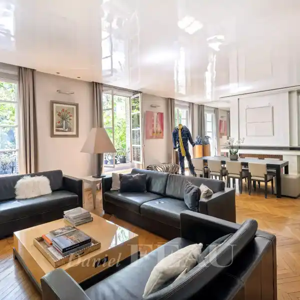 REFINED PARISIAN APARTMENT WITH SUNLIT DOUBLE RECEPTION