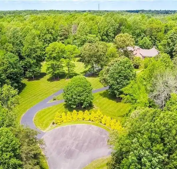 STUNNING SIX BEDROOM HOME ON TEN PRIVATE ACRES