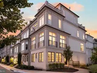 Sunlit End-Unit Retreat with Dual Roof Terraces