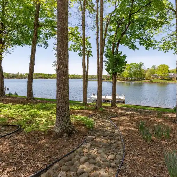 CUSTOM ESTATE HOME ON PRIME FAWN LAKE WATERFRONT