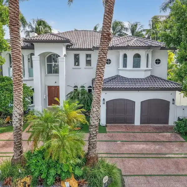 LAVISH ESTATE WITH SOARING FLOOR-TO-CEILING WINDOWS