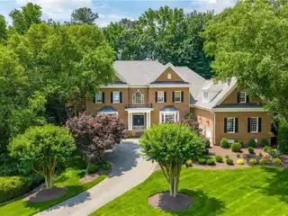 Stately Golf-front Brick Home
