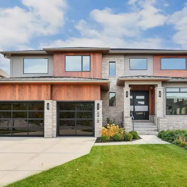 CUSTOM HOME IN THE COVETED STILLWATER ADDITION