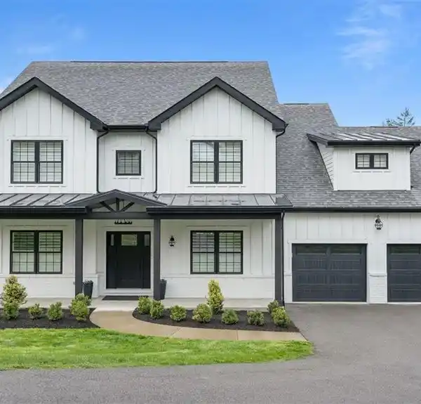 BEAUTIFULLY DESIGNED FARMHOUSE-STYLE HOME
