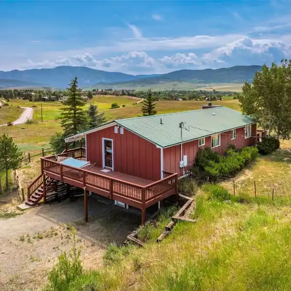 SUN-FILLED HOME ON 4.42 ACRES