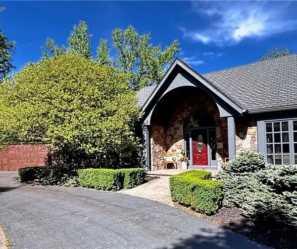 EXCEPTIONAL CUSTOM HOME IN A PRESTIGIOUS SUBDIVISION