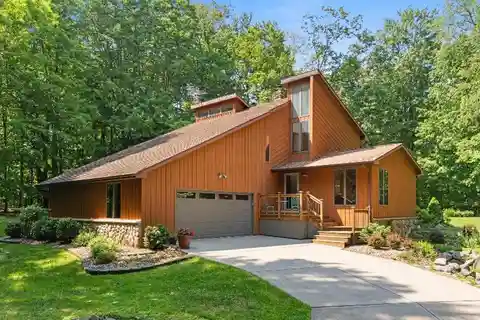 Meticulously Cared for Home on a Wooded Retreat