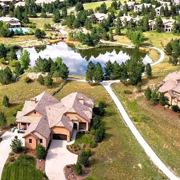 LOW-MAINTENANCE LUXURY LIVING IN A COVETED GATED COMMUNITY