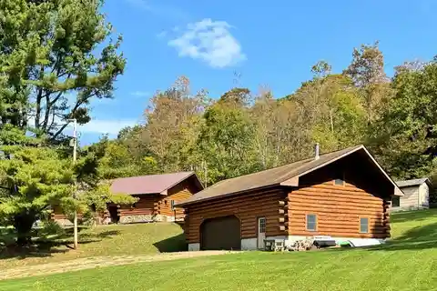 Picturesque Log Home on 90 Acres