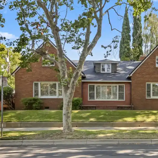 BEAUTIFULLY MAINTAINED HOME WITH TASETFUL UPDATES