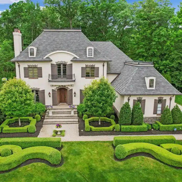 GRAND ESTATE ON A PREMIUM WOODED LOT