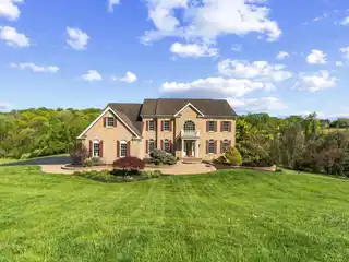Statement Home on Nearly Three Pristine Acres