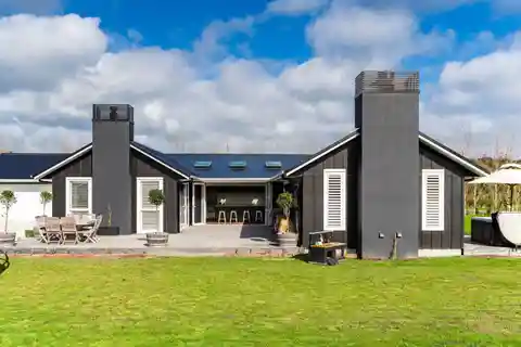 Curated Luxury with Vaulted Indoor-Outdoor Flow