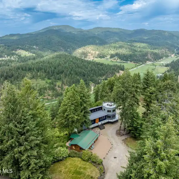 MODERN RETREAT ON 20 ACRES