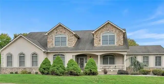 Immaculate Custom-built Cape Cod Home