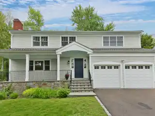 Elegant Colonial with Designer Finishes Throughout