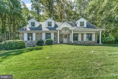 Cape Cod Charm with Seamless Indoor-Outdoor Flow
