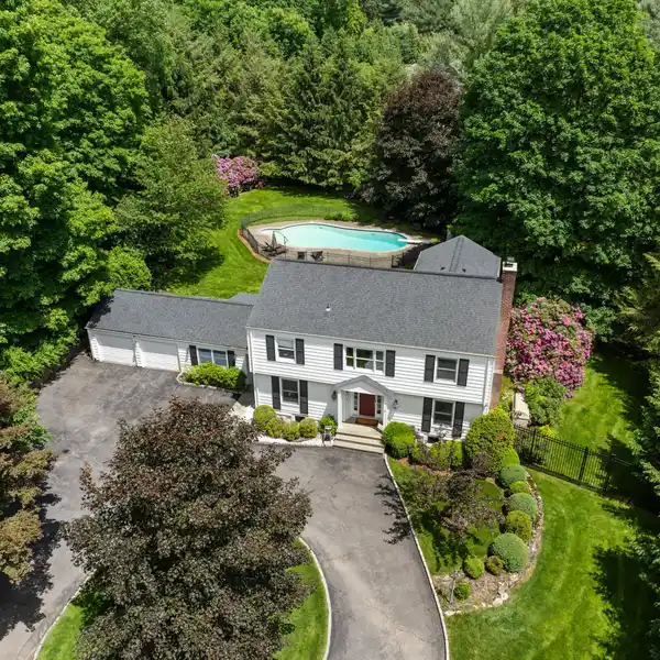 EXPANDED COLONIAL HOME BLENDING LUXURY AND CHARM