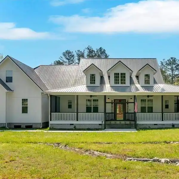 CUSTOM-BUILT HOME ON 8 ACRES