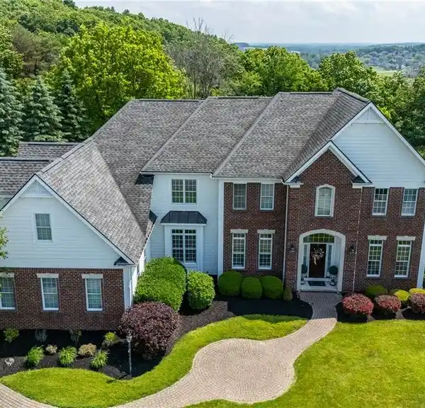 ELEGANT BRICK ESTATE STEPS FROM COBBLESTONE COUNTRY CLUB