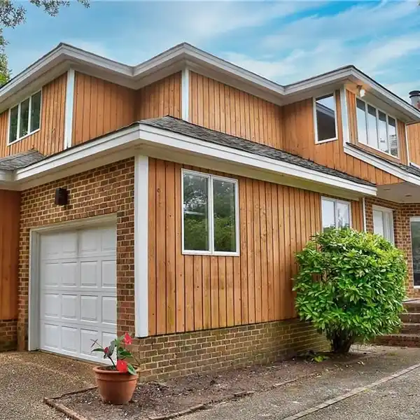 VAULTED COASTAL CHARM WITH GLEAMING INTERIOR FINISHES