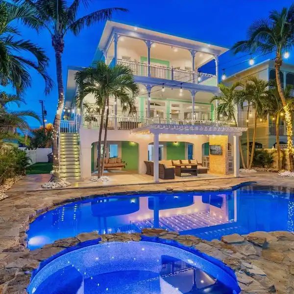 ONE-OF-A-KIND KEY WEST STYLE WATERFRONT BEACH HOME