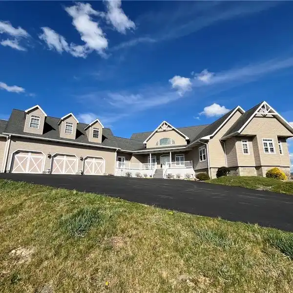 PRIVATE COUNTRYSIDE HOME ON JUST UNDER FIVE ACRES