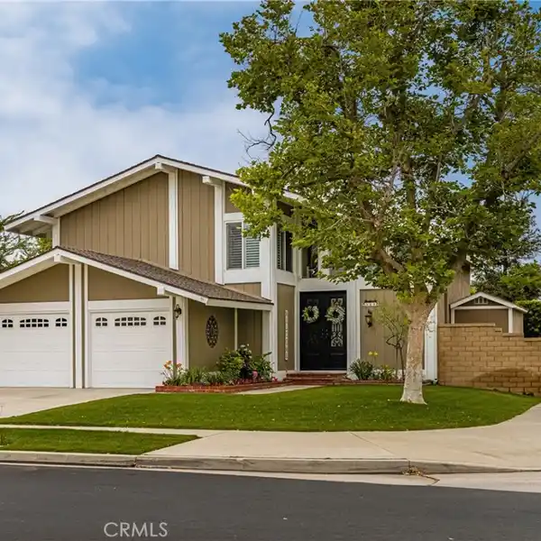 BEAUTIFULLY MAINTAINED HOME ON A PRIME CORNER LOT