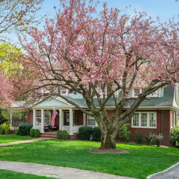 STUNNING SIX BEDROOM CENTER HALL COLONIAL