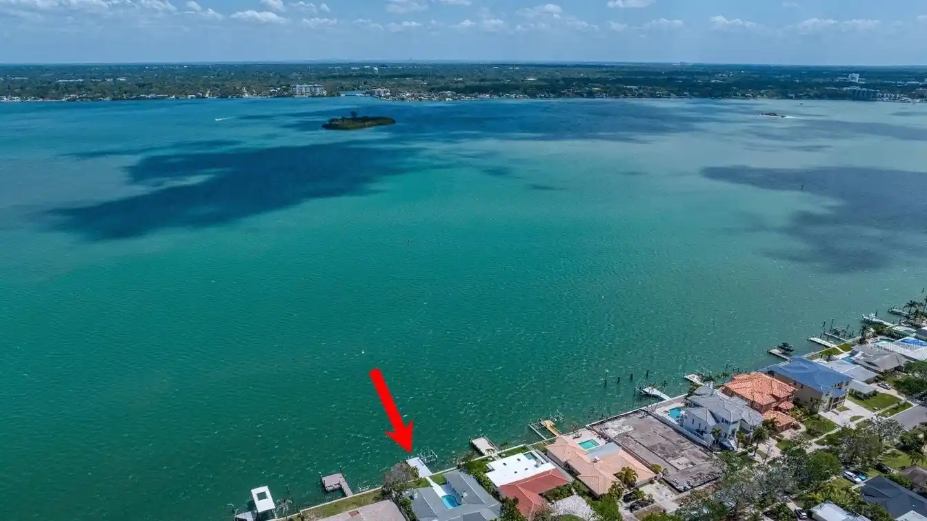 Exquisite Waterfront Living in Island Estates