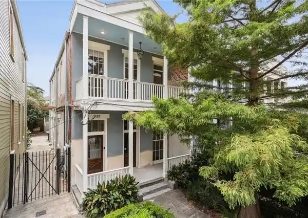 LOWER GARDEN DISTRICT HOME WITH CHEF KITCHEN AND OUTDOOR RETREAT