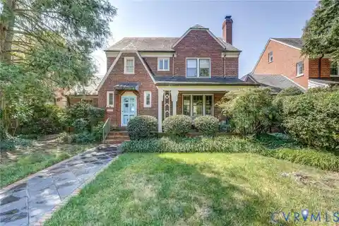 Timeless 1930s Tudor Brick and Slate Home