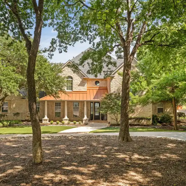 CUSTOM LAKEFRONT ESTATE ON AN EXCLUSIVE CUL-DE-SAC