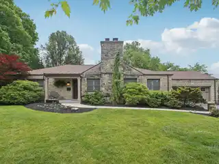 Custom Stone Mid-century Modern Ranch in Riverlea
