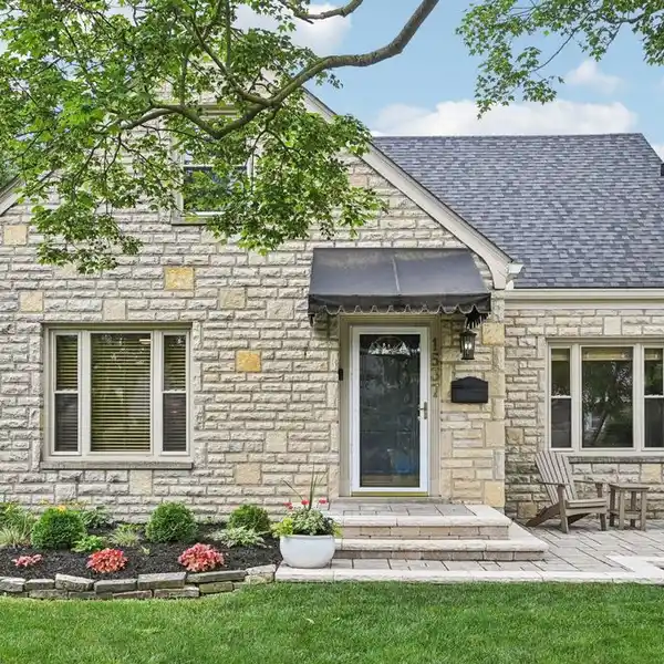 LOVELY STONE AND STUCCO HOME IN A SOUGHT-AFTER NEIGHBORHOOD