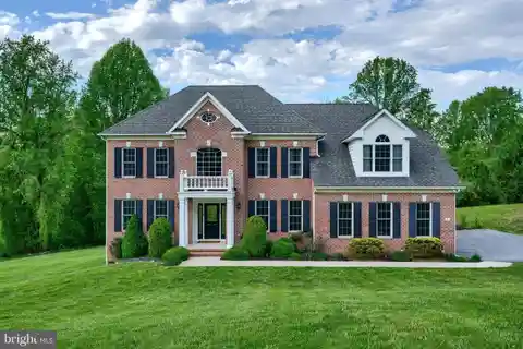 Elegant Colonial Retreat on Private 4-acre Estate