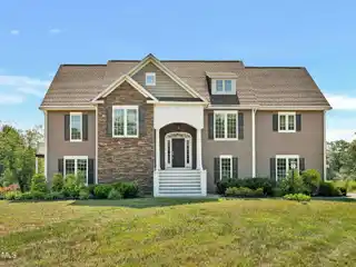 Comfortable Riverfront Living on over Three Acres