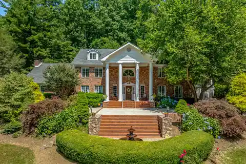 Multi-Generational Oasis on Two Wooded Acres