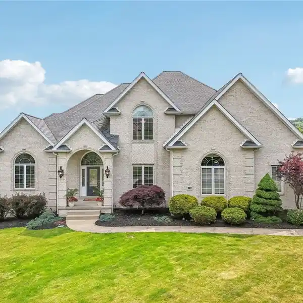 LUXURY BRICK HOME WITH HEATED SALTWATER POOL