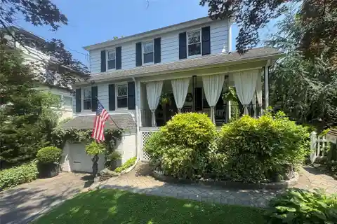Sunny Colonial Retreat with Beautiful Blooming Gardens