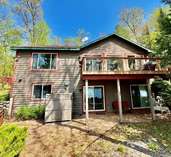 CEDAR LAKEFRONT HOME WITH STUNNING VIEWS