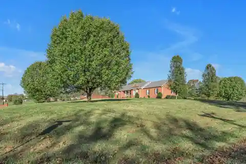 Brick Ranch Home on over Two Acres
