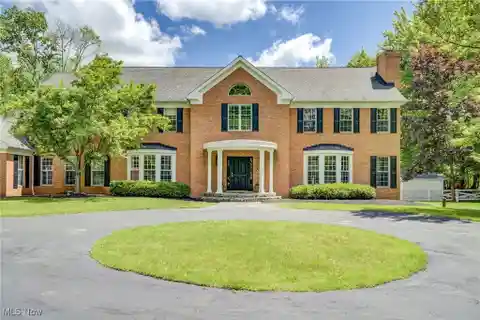 Grand Brick Estate Surrounded by Woods