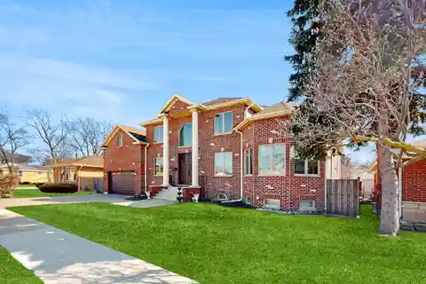 Stately Brick Home with Dramatic Architectural Flair
