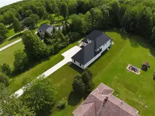 Bold New-Build with Acre of Wooded Privacy