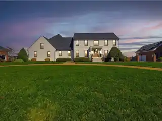 Rebuilt Colonial with Panoramic Riverfront Luxury