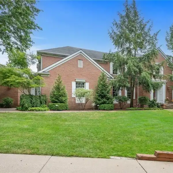 GRAND BRICK COLONIAL IN PRESTIGIOUS NEIGHBORHOOD