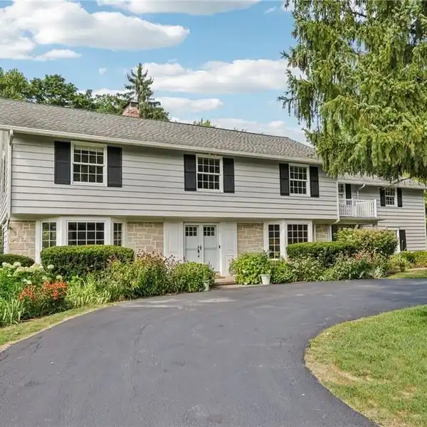 STUNNING CENTER HALL COLONIAL WITH CUSTOM DETAILS