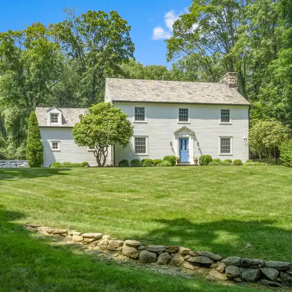 UPDATED MODERN FARMHOUSE ON OASIS-LIKE PROPERTY