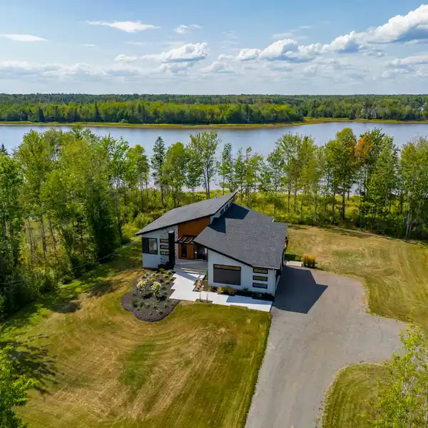 SPACIOUS, STYLISH, AND STEPS FROM THE SHORELINE